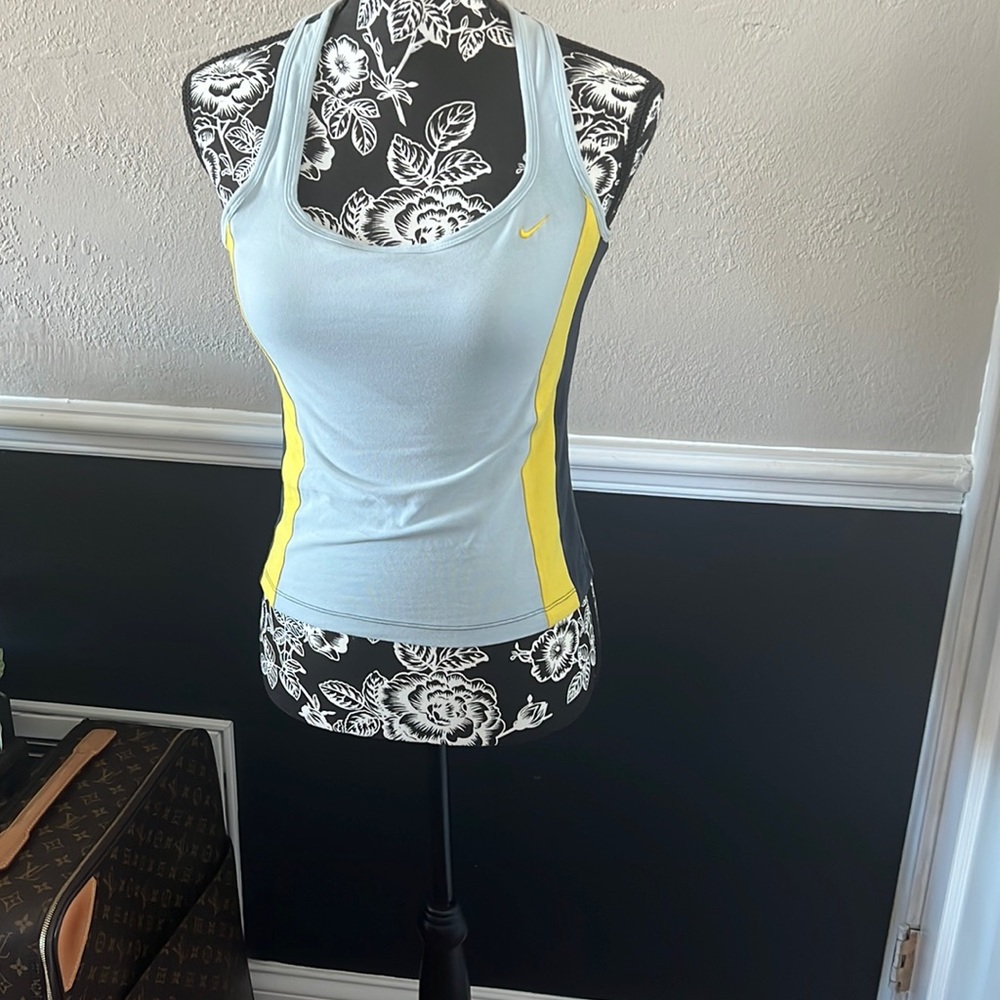 Nike workout top. Light blue, navy blue and yellow. Size M